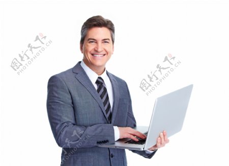 手拿笔记本电脑的商务男士图片