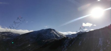 高山雪峰日出风景图片