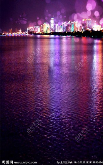 灯火阑珊海滨城市夜景图片