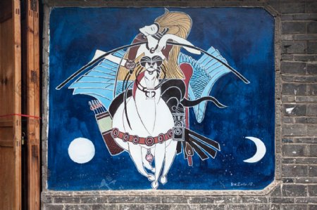 丽江纳西族墙画月亮女图片