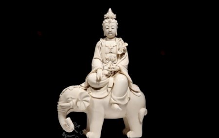 德化白瓷骑狮文殊菩萨像图片