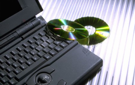 手提電腦與光碟片图片