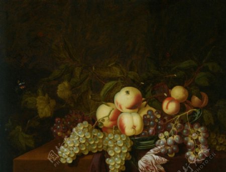 桌子上的桃和葡萄图片
