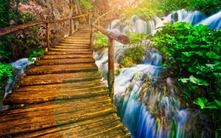 美丽的风景瀑布木桥影楼背景图片