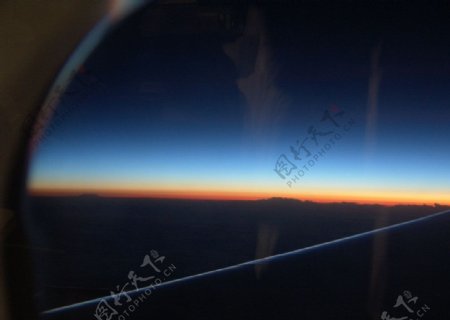 飞机上看日出图片