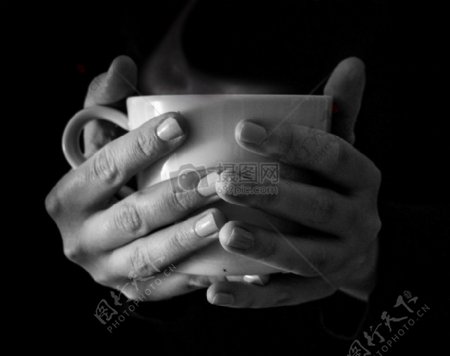 黑与白手咖啡杯喝茶热温饮料