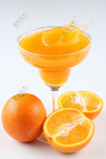 橙汁饮料摄影图片