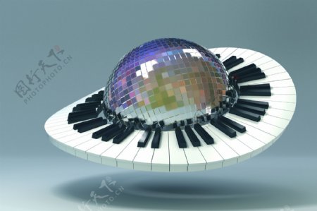键盘与金属球组合的创意背景图片