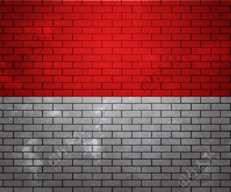 摩纳哥在砖墙上的旗帜