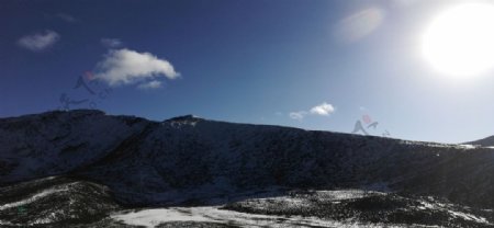 日落雪山风景图片