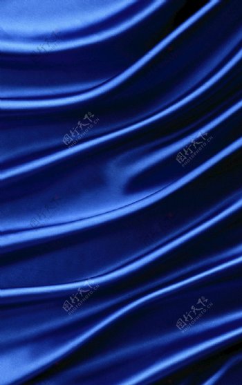 蓝色丝绸布纹纹理缎子图片